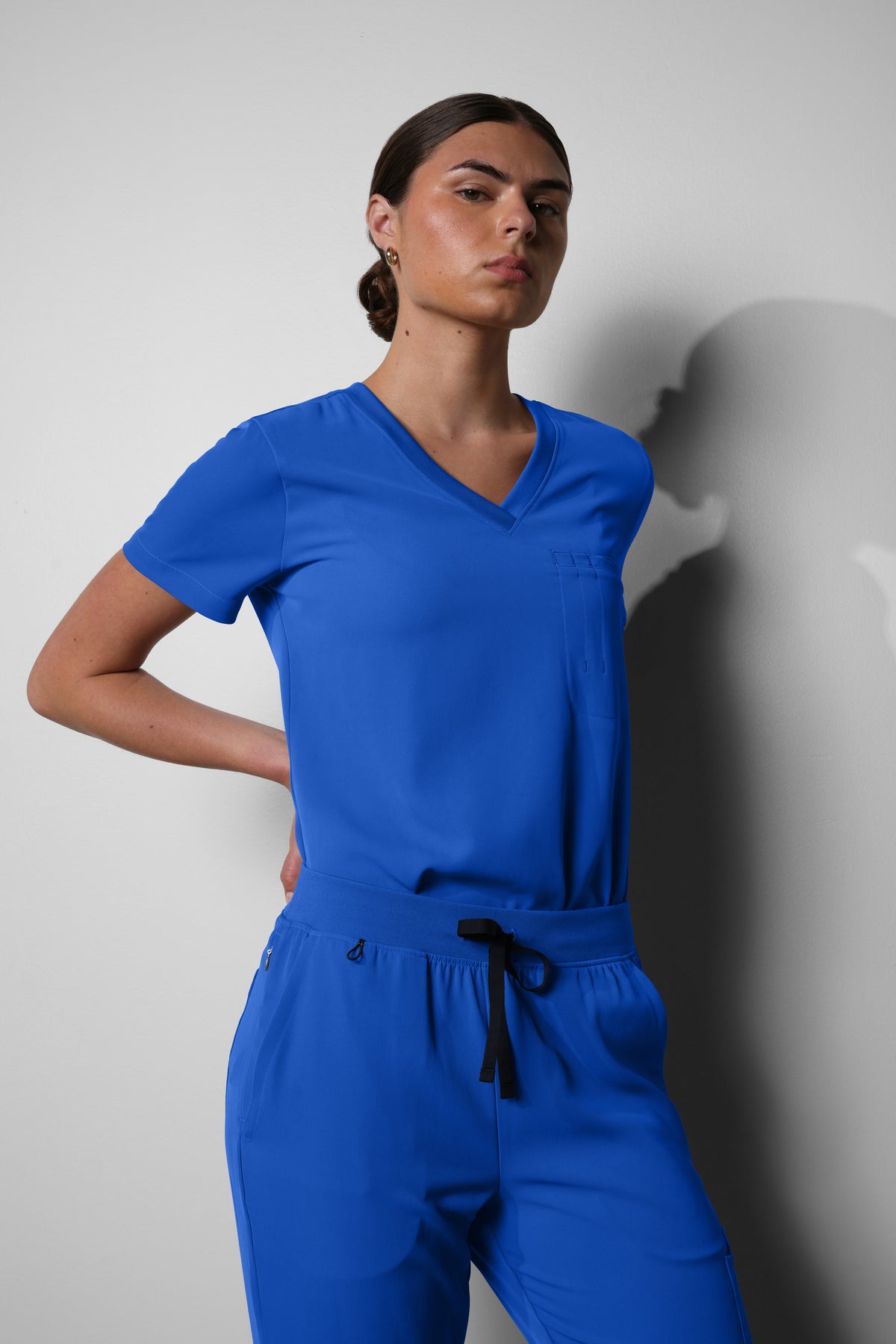 Women's No.10 Short Sleeve V-Neck 1 Pocket Scrub Top in PerformaCREPE